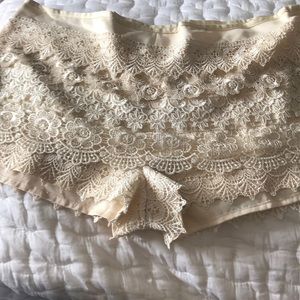 Lacy shorts in cream color